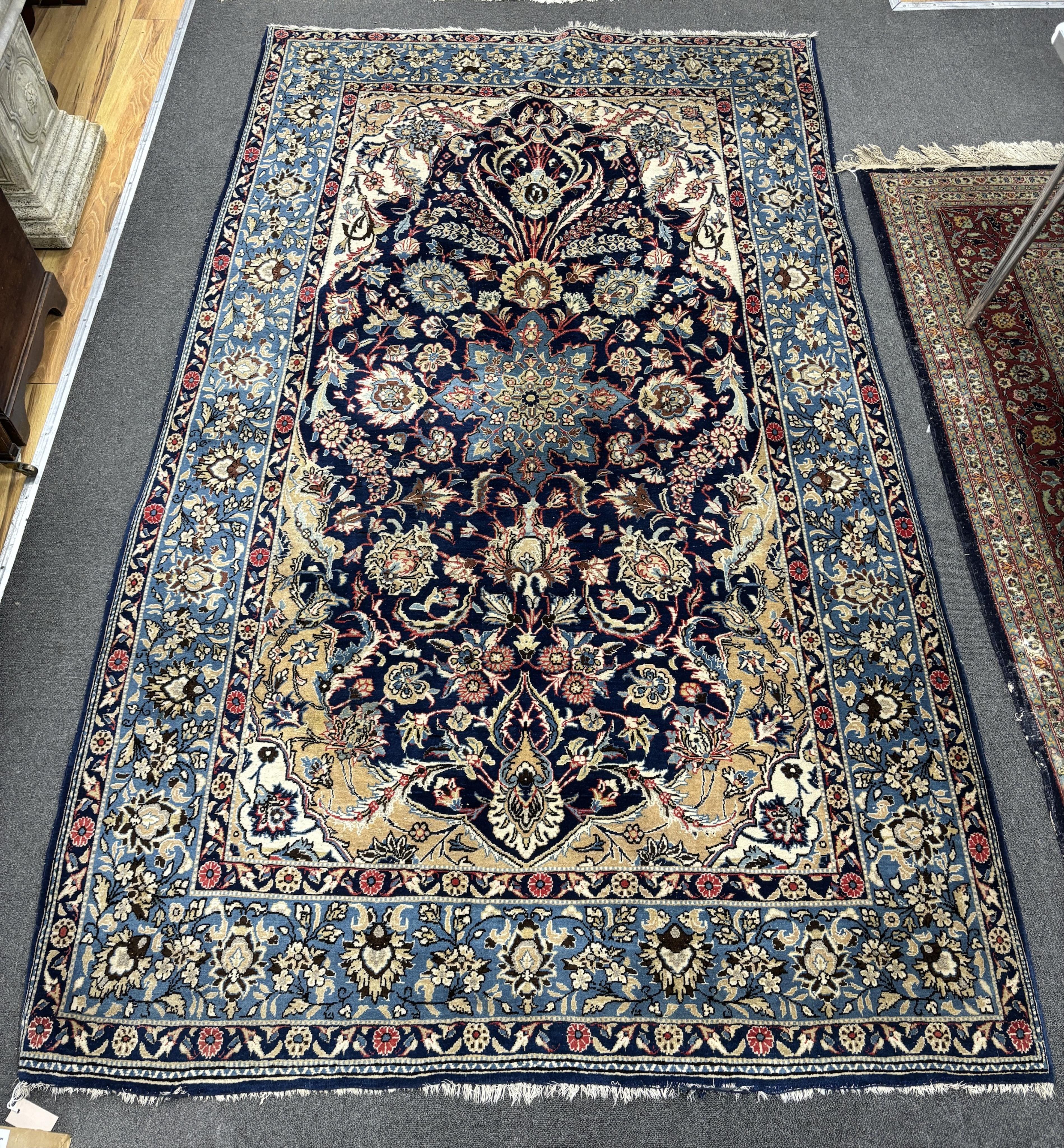 A North West Persian blue ground carpet, 270 x 158cm